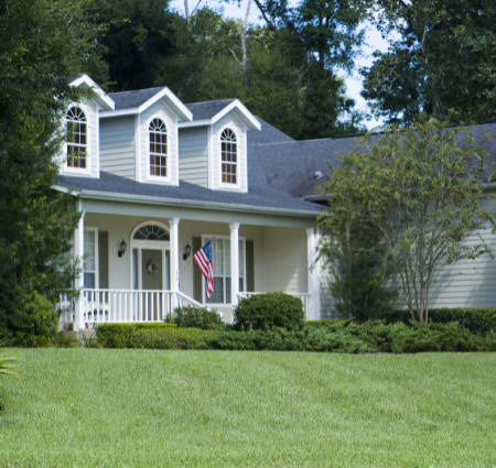 House with American flag House with American flag