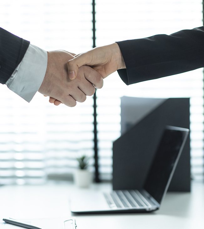 Handshake in business meeting 